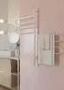 A modern bathroom with a heated towel rack. Anteprima dell’immagine prodotto