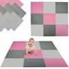 A baby crawling on a play mat made of interlocking foam tiles. Produktbild-Vorschau