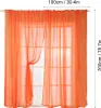 Orange sheer curtains hanging on a window. Produktbild-Vorschau