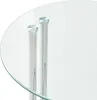A close-up view of a round glass tabletop supported by two chrome-colored cylindrical legs. Produktbild-Vorschau