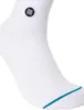 A close-up view of a white sock with a teal stripe at the cuff and a black logo. Produktbild-Vorschau