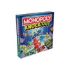 A Monopoly Knockout board game box shown at an angle against a white background. Voir les images du produit