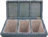 An open blue wicker laundry sorter with three internal beige fabric compartments, shown from a slightly elevated front view against a white background. Produktbild-Vorschau