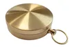 A brass compass with a keychain ring is shown against a white background. Produktbild-Vorschau