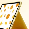 A close-up view of a tablet case with an orange fruit pattern. Náhľad obrázku produktu