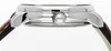 A close-up side view of a watch case and strap. Náhled obrázku produktu