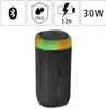A black Bluetooth speaker with colorful LED lights on top, shown against a white background with feature icons above. Voir les images du produit