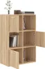 A light brown wooden cabinet with multiple shelves and doors, some of which are open. Náhled obrázku produktu