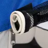 A close-up view of the rolled-up edge of a blue fabric product, showing a zipper and mesh material. Náhled obrázku produktu