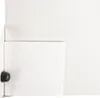 A close-up view of a white washing machine pedestal with a black knob on the left side. Náhľad obrázku produktu