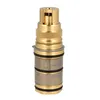 A close-up studio shot of a brass faucet cartridge. Produktbild-Vorschau