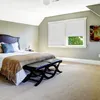 A bedroom scene with a bed, window, and artwork. Produktbild-Vorschau