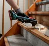 A person is using a Metabo multitool to remove material from a wooden stair. Náhľad obrázku produktu
