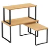 A set of three stackable kitchen shelves with bamboo-like surfaces and black metal frames, arranged in an L-shape. Produktbild-Vorschau