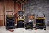 A collection of Dewalt toolboxes stacked and arranged in a workshop or storage area. Anteprima dell’immagine prodotto