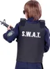 A child wearing a SWAT costume, seen from the back, holding a toy rifle. Produktbild-Vorschau