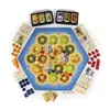 A board game called 'Siedler aus Katan' is laid out on a white surface, with all its components visible. Náhled obrázku produktu