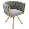 A studio shot of a gray upholstered chair with gold metal legs. Produktbild-Vorschau
