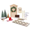 A collection of miniature Christmas-themed decorative items, including a door, trees, a mailbox, a sled, and various signs. Produktbild-Vorschau