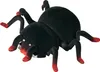A black toy spider with red accents on its legs and head, shown from a slightly elevated side angle against a white background. Produktbild-Vorschau