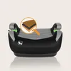 A child booster seat with a close-up diagram showing its layered material. Náhled obrázku produktu