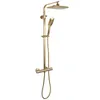 A gold shower set with a rain shower head and a handheld shower head on a white background. Produktbild-Vorschau