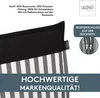 Close-up of a cushion with black and white stripes, showing product details and brand logo. Produktbild-Vorschau