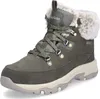 A single green winter boot with white fur trim is shown against a white background. Anteprima dell’immagine prodotto