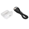 A white charging dock and a black USB cable are placed on a white background. Náhľad obrázku produktu