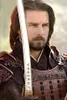 A man dressed as a samurai holding a katana. Produktbild-Vorschau