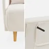 Close-up details of a cream-colored fabric chair. Anteprima dell’immagine prodotto