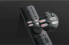 A close-up of a remote control with a magnified view of some of the buttons. Voir les images du produit