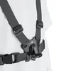 A close-up view of a black sports phone harness worn by a person, showing the adjustable straps and mounting mechanism. Náhľad obrázku produktu
