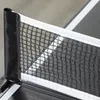 A close-up view of a table tennis net on a table tennis table. Produktbild-Vorschau