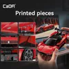 A collage of images showing details of a red toy car, with a larger image of the car in the background and a hand holding a smaller version of the car in the foreground. Anteprima dell’immagine prodotto
