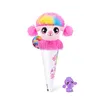 A plush toy poodle in a cone-shaped packaging, with a small purple poodle figure next to it, on a white background. Podgląd zdjęcia produktu