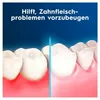 A close-up illustration of teeth and gums, showing a before and after comparison of gum health. Produktbild-Vorschau