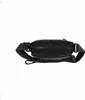 A black crossbody bag is shown from a top-down perspective against a white background. Anteprima dell’immagine prodotto