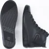 A top-down view of a pair of black Ecco women's high-top sneakers, with one shoe shown from the side and the other from the sole. Produktbild-Vorschau
