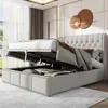 A bed with its storage compartment open, showing the mattress lifted by hydraulic supports. Produktbild-Vorschau