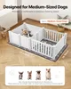A white dog playpen is set up on a wooden floor, with two small dogs inside. Dimensions are shown with text overlays. Below the playpen, four different dog breeds are pictured. Podgląd zdjęcia produktu