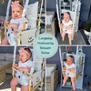A collage of four images showing a baby in a wooden swing, with text overlay. Produktbild-Vorschau
