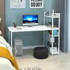 A white computer desk with a monitor, computer tower, and shelving unit in a room with blue walls. Produktbild-Vorschau