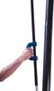 A hand is holding a blue handle attached to a black pole, which is part of a basketball hoop system. Produktbild-Vorschau