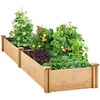 A wooden raised garden bed filled with various plants, including tomatoes and lettuce. Produktbild-Vorschau