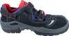 A side view of a black safety sandal with red and blue accents. Produktbild-Vorschau