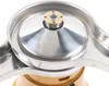 A close-up view of the top part of a milk separator machine. Náhled obrázku produktu