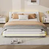 A modern bedroom with a white upholstered bed and LED lighting. Náhled obrázku produktu