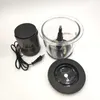 A food chopper is laid out with its accessories on a white background. Produktbild-Vorschau