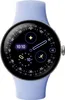 A close-up shot of a Google Pixel Watch with a purple sport band, displaying its watch face. Podgląd zdjęcia produktu